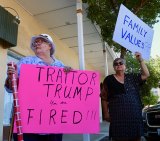 Connie Wlaschin (left) and Klara East (right) spent Friday morning (June 22) at Congressman David Valadao's Hanford office protesting the Trump administration's immigration policies.